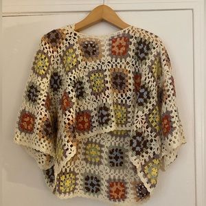 Crocheted sweater with hood